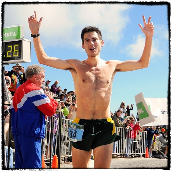 Sage Canaday, of Boulder, raises his hands in victory, after winning the 52nd running of The Northeast Delta Dental Mount Washington Road Race, with an official time of 58:27, in Pinkham Notch, NH, on June 16th, 2012. 1,200 runners raced up the 7.6 mile Mo